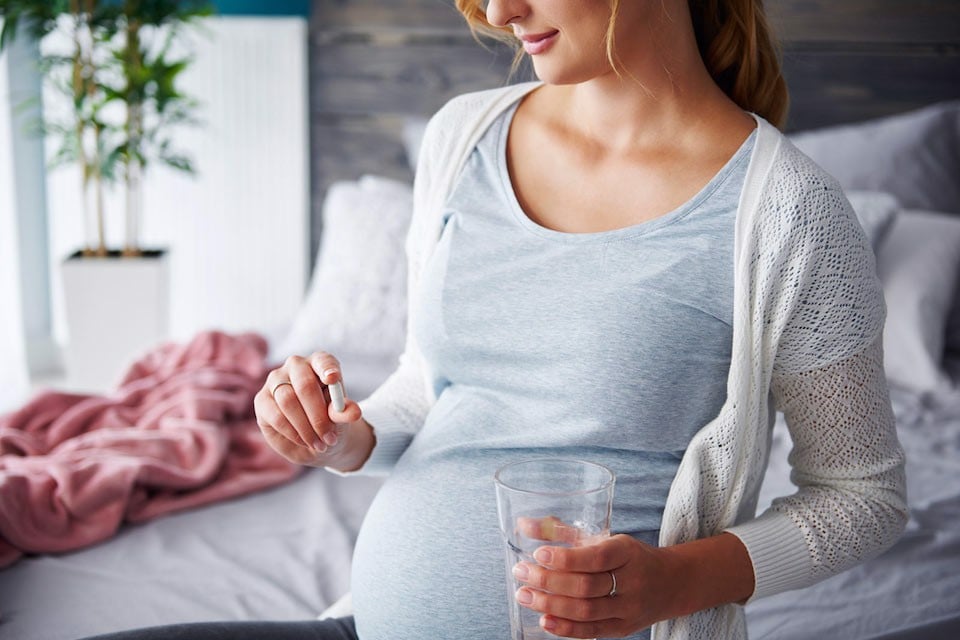 Quá trình mang thai ảnh hưởng đến việc hấp thụ và sử dụng vitamin E trong cơ thể như thế nào?
