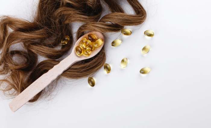 Vitamin E giúp dưỡng tóc bóng mượt hơn