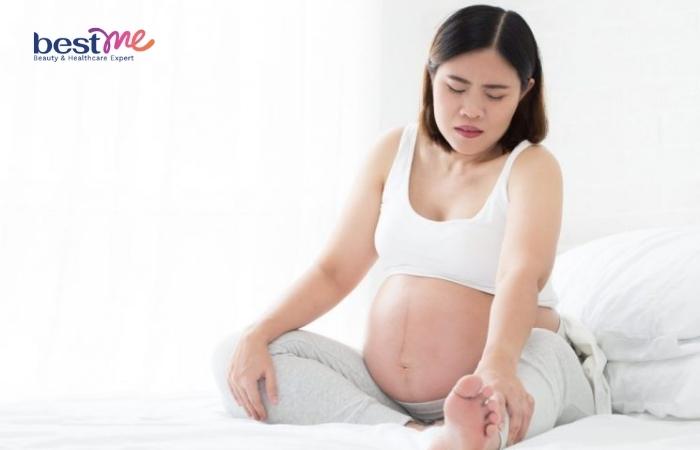 Đau nhức cơ bắp là triệu chứng thiếu canxi ở bà bầu khá phổ biến