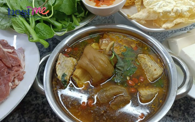 huong-dan-cach-nau-lau-chan-bo-ham-sa-mem-thom-tai-nha-1 Hướng dẫn cách nấu lẩu chân bò hầm sả mềm thơm tại nhà - 1