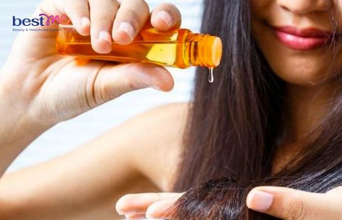 Thoa tinh dầu dưỡng ẩm cho tóc mềm mượt, óng ả